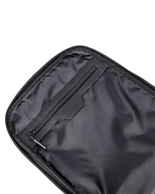 Zipper pocket on inside of black backpack