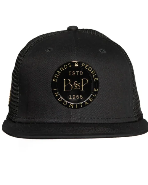 Front view of a black hat with Glossy Black OG B&P logo on front and pinecone on the side