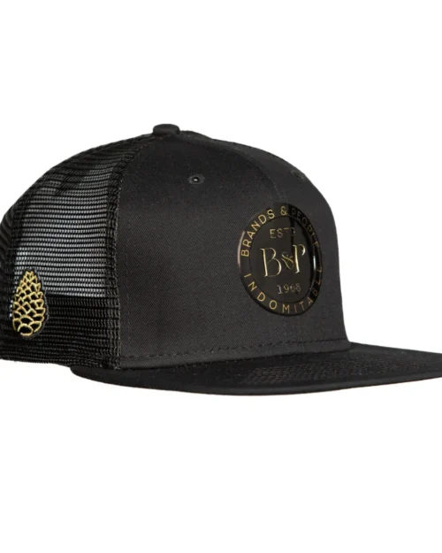 Side view of a black hat with Glossy Black OG B&P logo on front and pinecone on the side