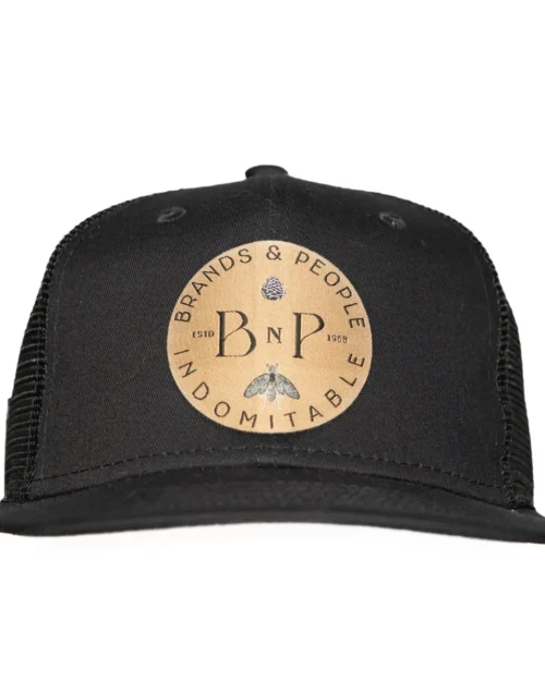 Front view of a black hat with Old Gold B&P logo on front and pinecone on the side